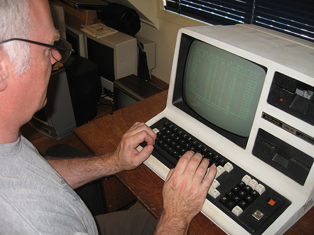 At work on the TRS-80 Model 4