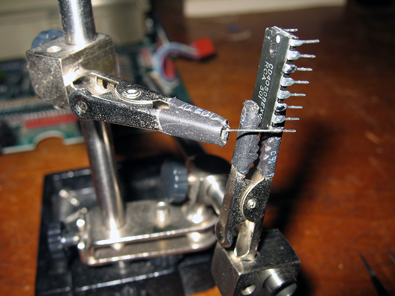 Soldering legs to an IC